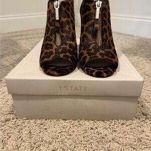 1. State Leopard Peep-Toe Zip Front Mules in Brown and Black